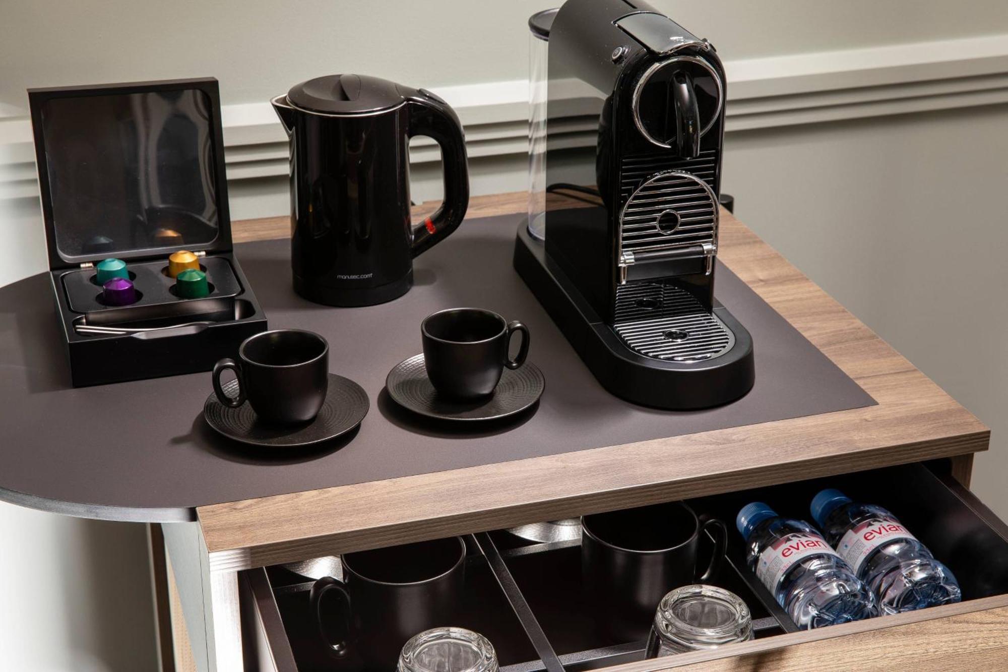 Maison Rouge Strasbourg Hotel & Spa, Autograph Collection Exterior foto A Nespresso coffee machine in a hotel room